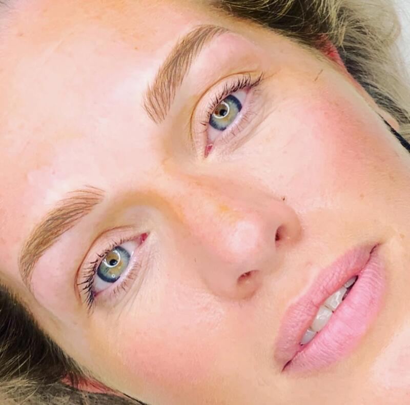A client with softly defined, natural-looking brows
